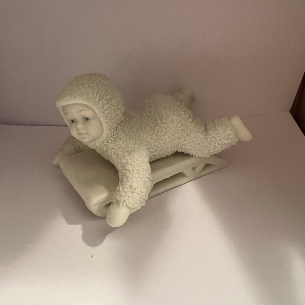 Charming Snowbaby Figurine On Sled - Cozy Winter Accent